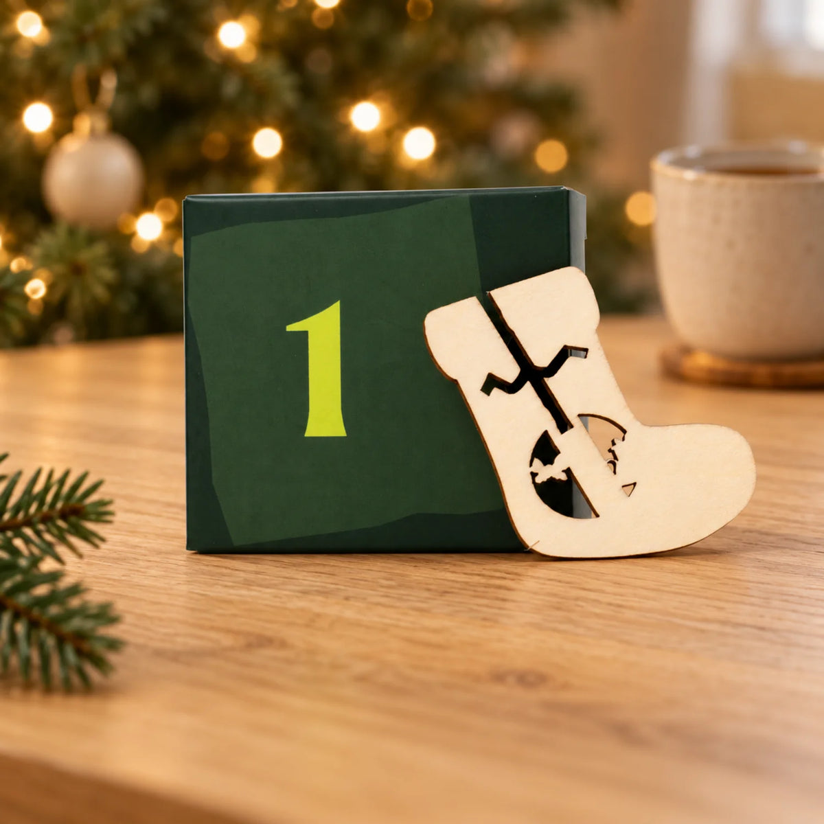 Box number 1 from the Advent calendar next to a wooden boot-shaped ornament