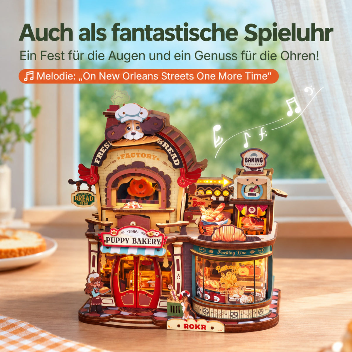 Dream Bread Factory 3D - «Maquette en bois » en boîte à musique sur le rebord de la fenêtre, des notes de musique flottent au-dessus de la boulangerie en bois