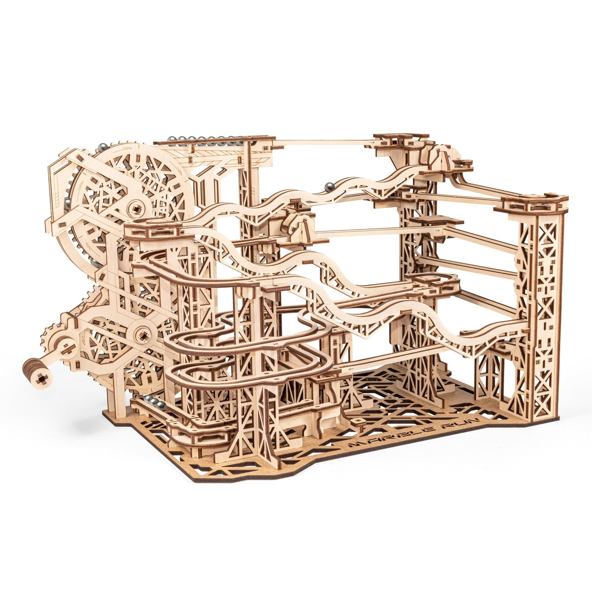 Cyclone Marble Run wooden marble run, fully assembled and shown on a white background, viewed at an angle from the front with a crank