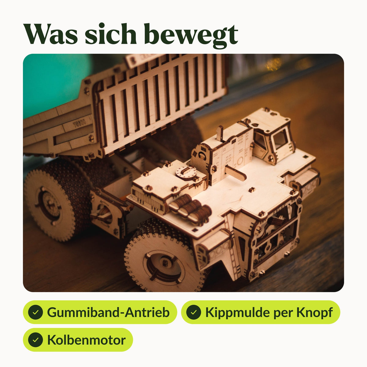BELAZ 75600 Holzmodell mit gekippter Mulde: Gummiband-Antrieb, Kippmulde per Knopf und beweglicher Kolbenmotor