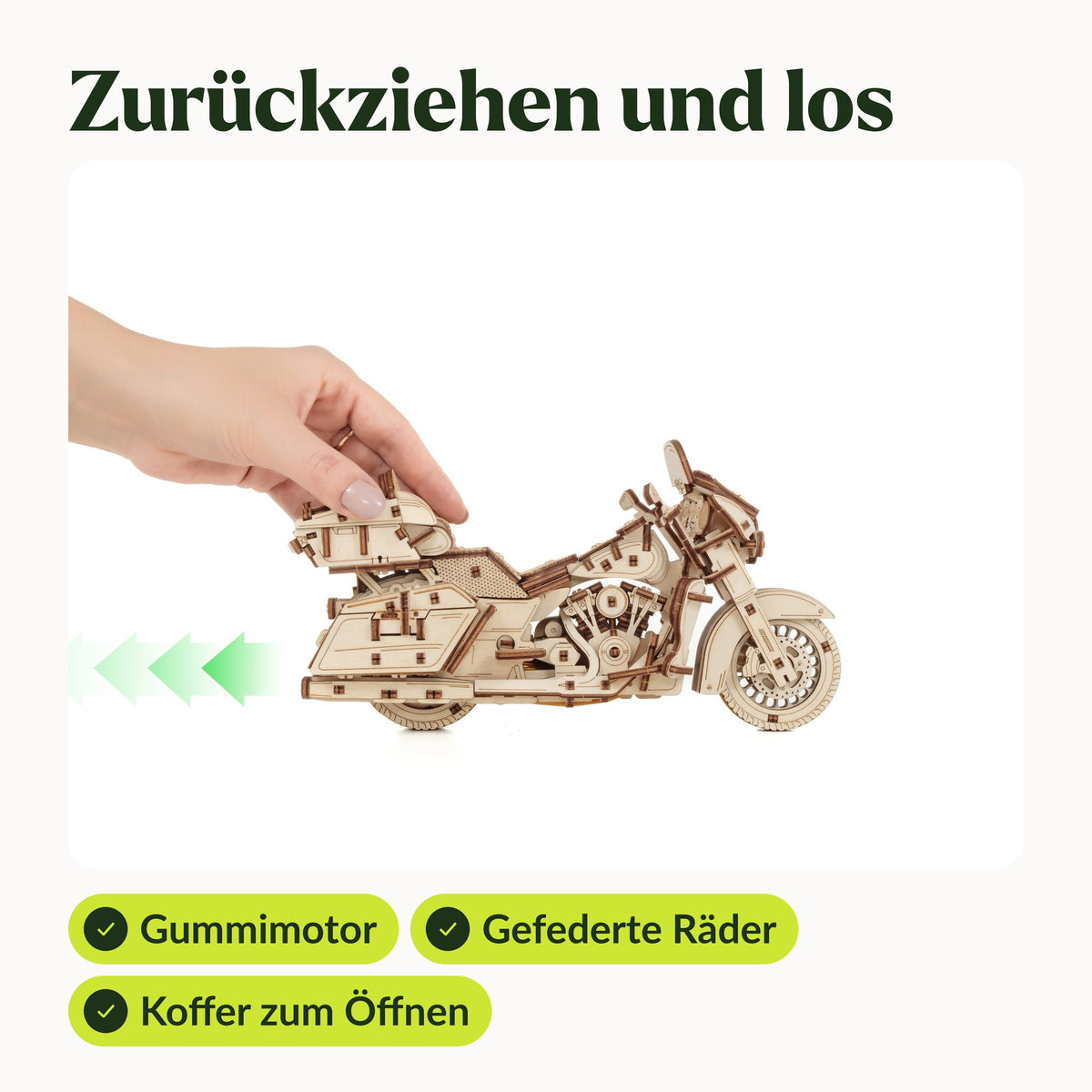 Wooden motorcycle model; pull it back with one hand: rubber motor, spring-loaded wheels, and a trunk that opens