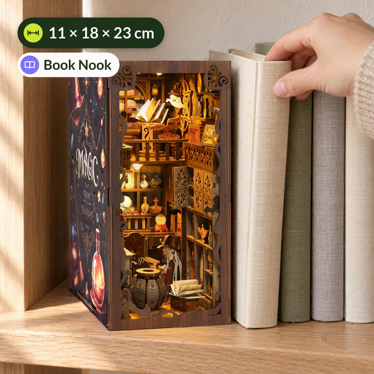 MagicNight Book Nook, size comparison on a light-colored bookshelf: 11 × 18 × 23 cm, as tall as a hardcover book