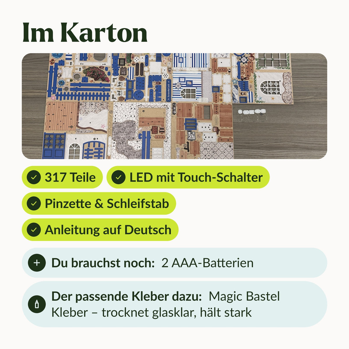 Santorini Café Miniaturhaus, im Karton: bedruckte Holzbogen, LED mit Touch-Schalter, Pinzette, Anleitung