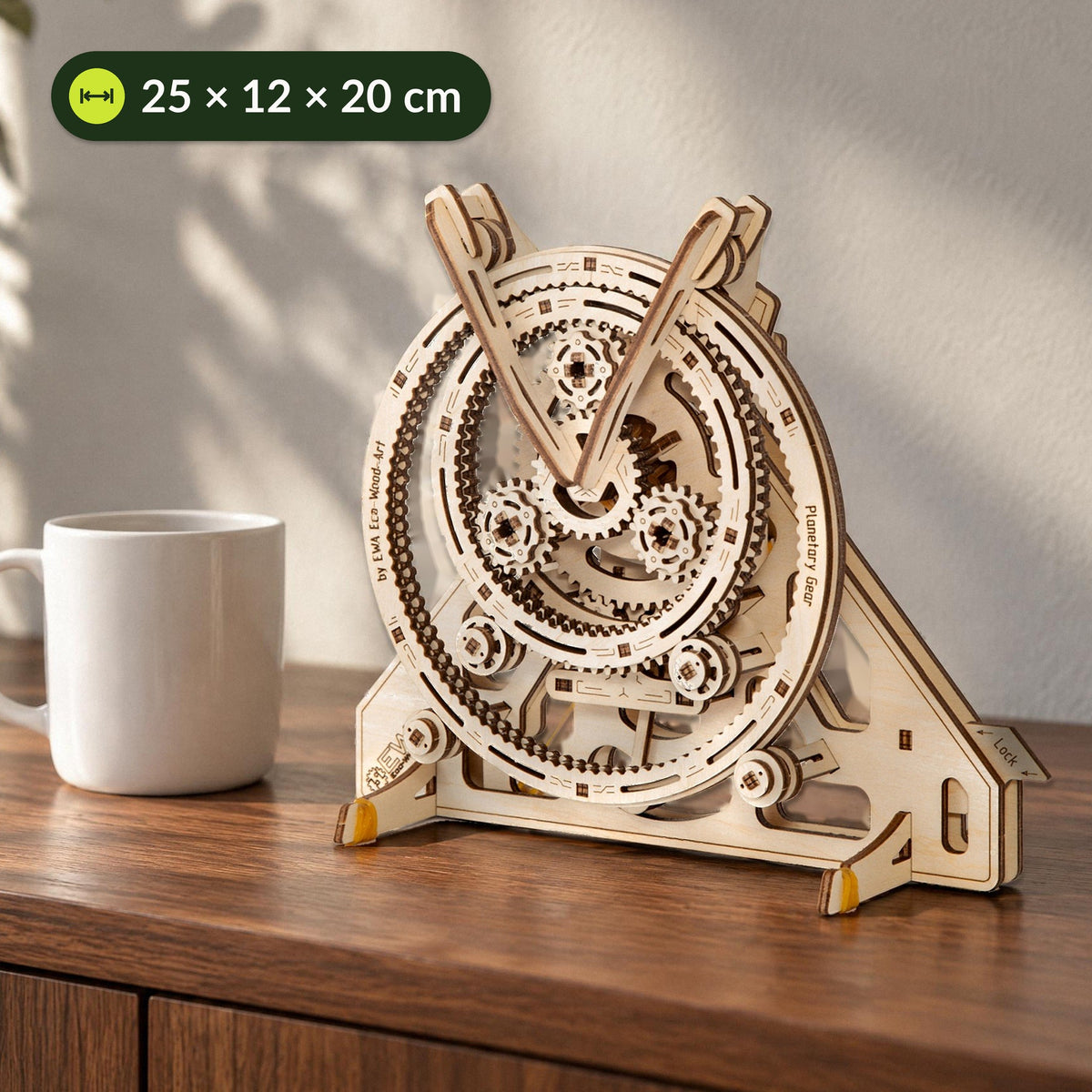 Planetary gear set next to a coffee cup on the sideboard, measuring 25 × 12 × 20 cm, mechanical kit