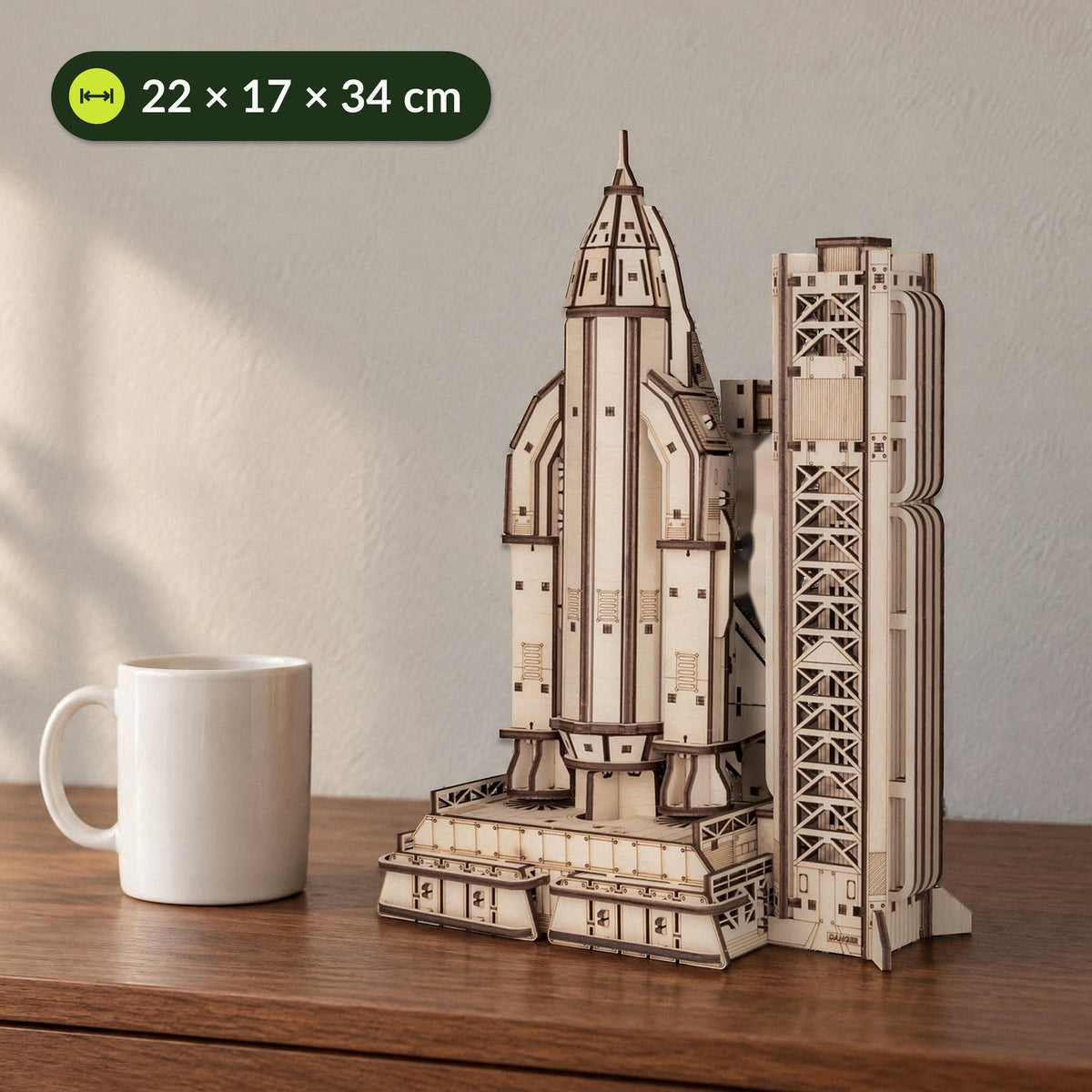 Wooden model of the Space Shuttle next to a coffee cup on the sideboard, measuring 22 × 17 × 34 cm, mechanical kit