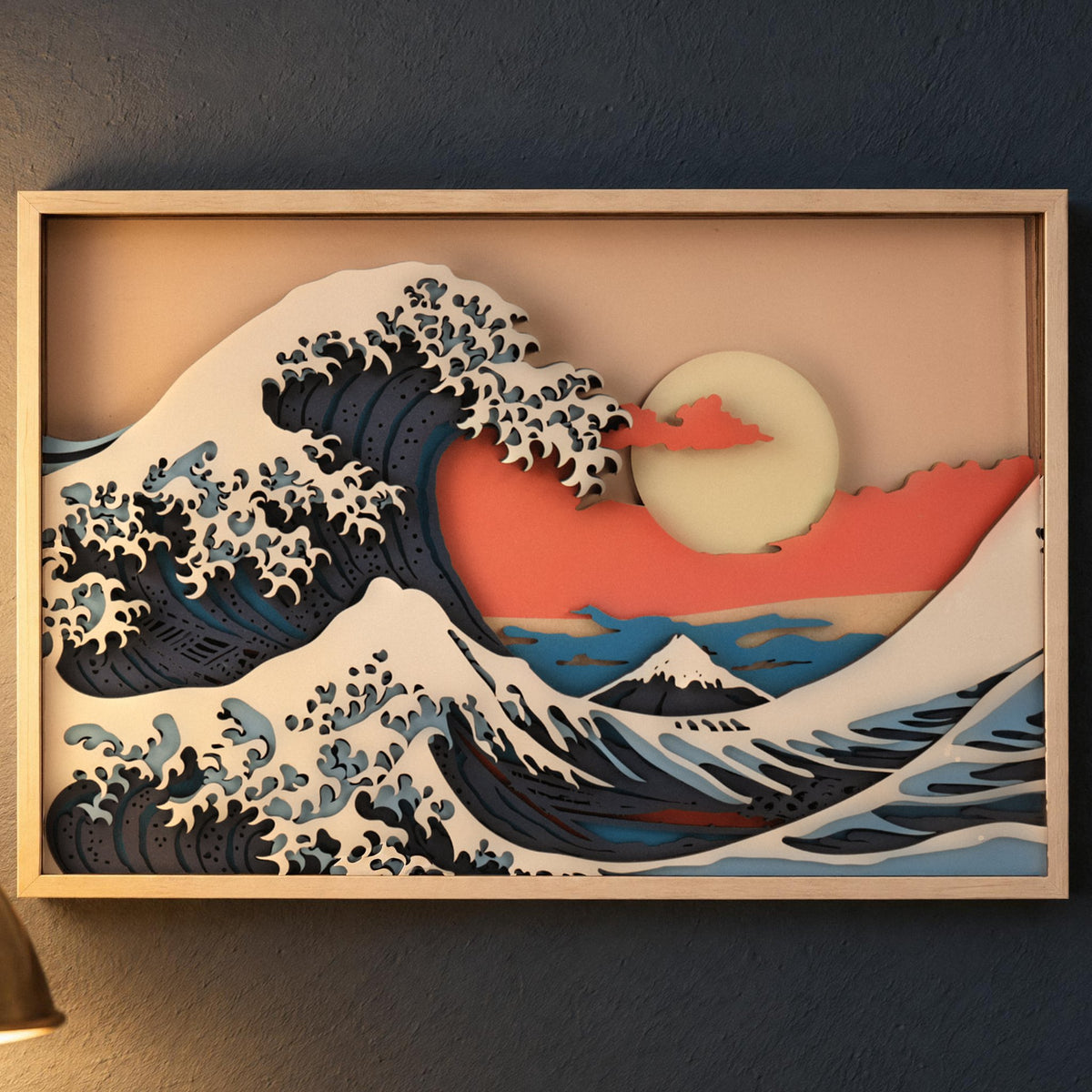 Magic Wall Art | 3D Wall Art, "The Great Wave" on a dark blue wall in the warm glow of a reading lamp in the evening