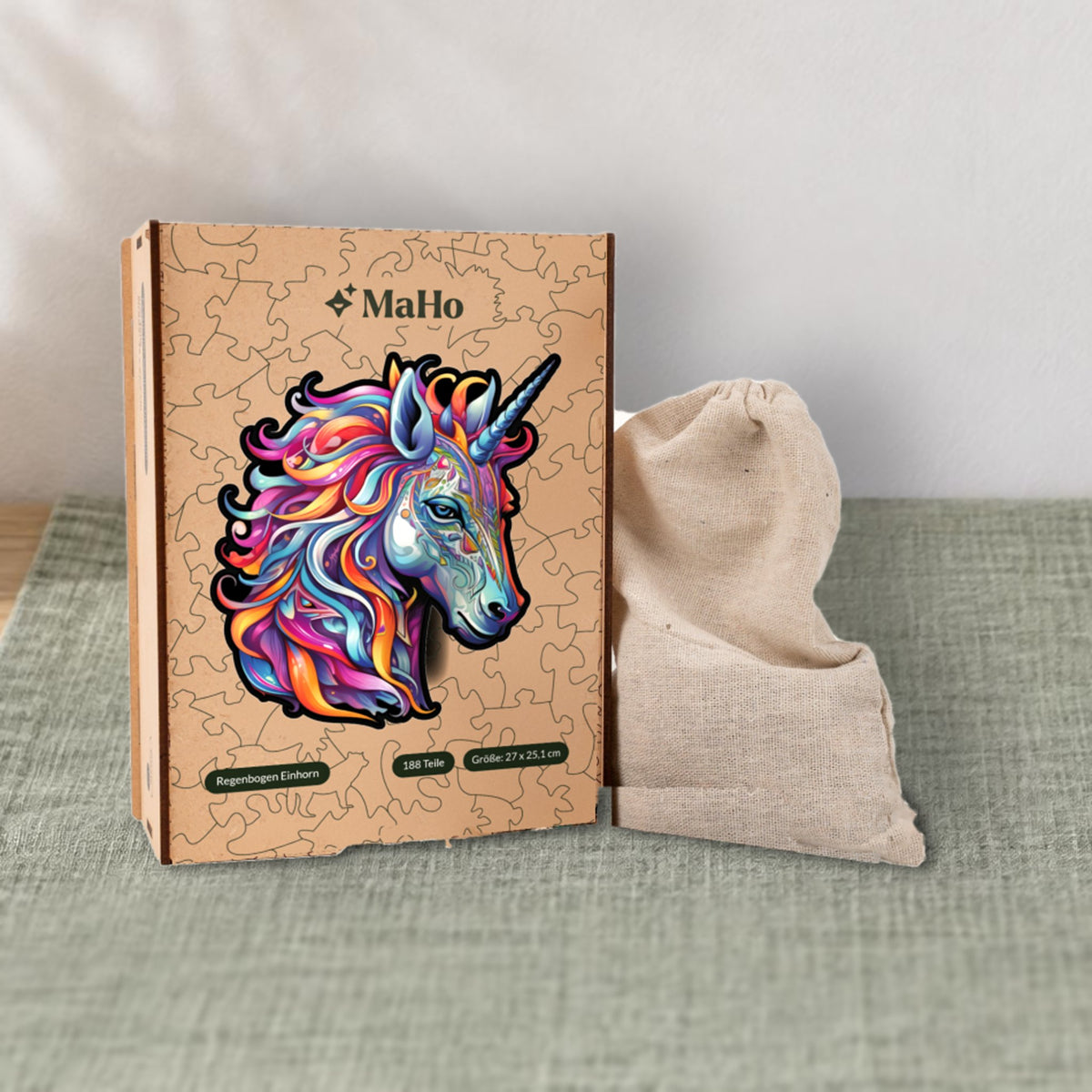 Rainbow Unicorn Wooden Puzzle, Premium Wooden Box with Unicorn Design and Cloth Pouch on a sage-green linen runner