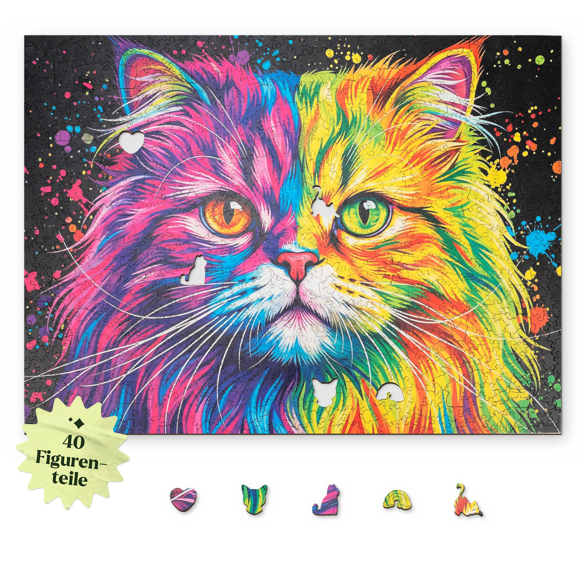 Puzzle en bois représentant un chat persan coloré, motif vu d'en haut sur fond blanc, avec en dessous des pièces représentant notamment un cœur, une tête de chat et un chat assis