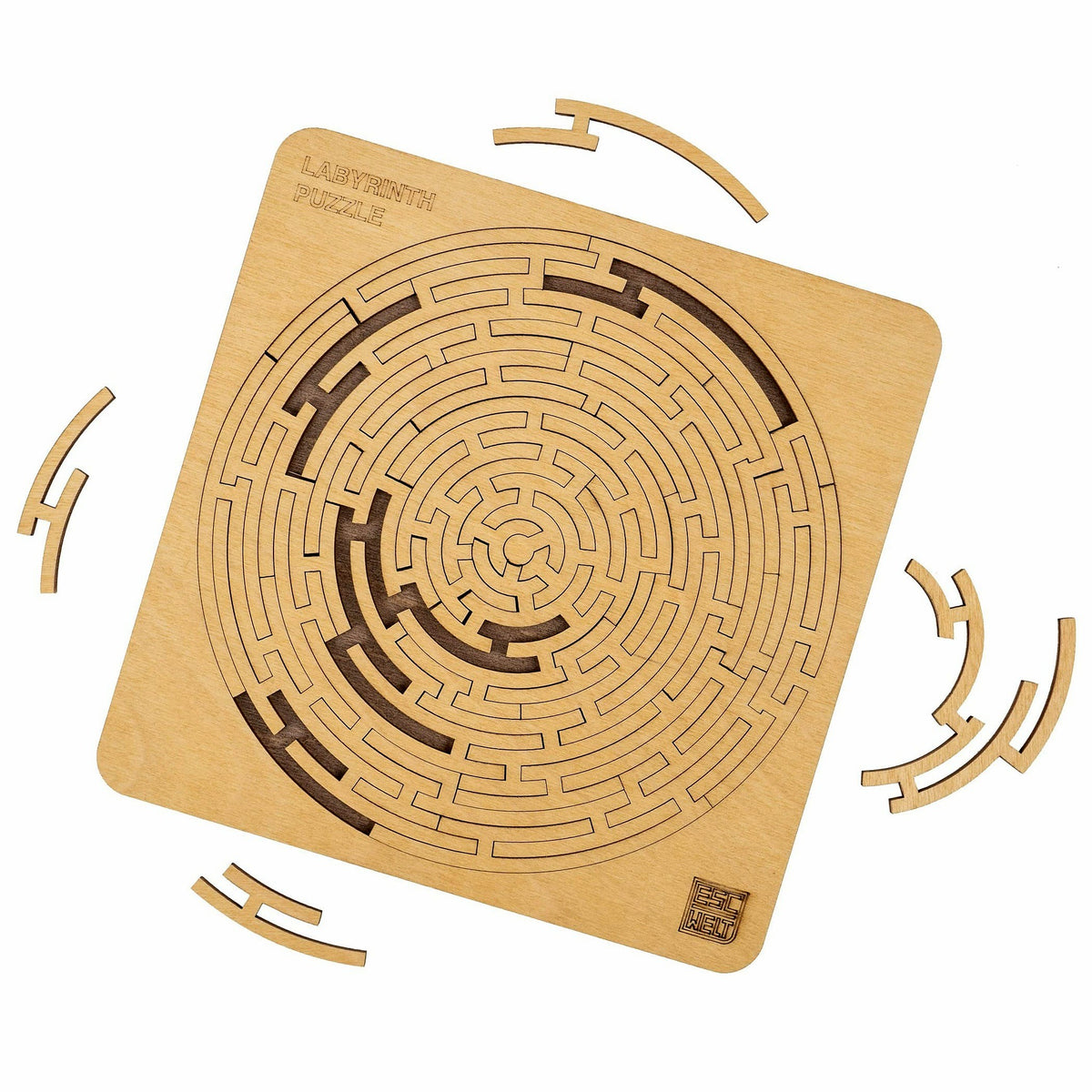 Maze Puzzle on White: Wooden board with a maze and several removed pieces next to it