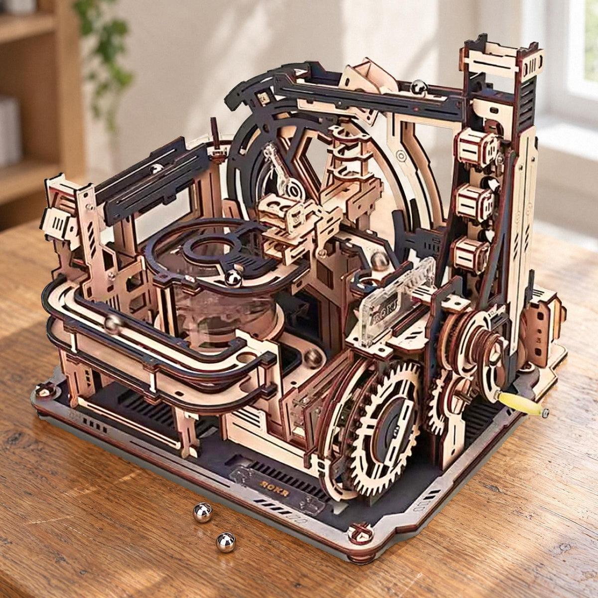 Marble Spaceport wooden marble run, fully assembled on an oak desk in bright daylight