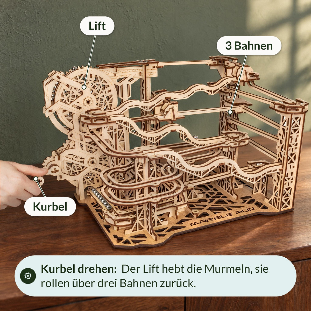 Cyclone Marble Run Wooden Marble Run: Turn the crank with one hand, and the lift raises the marbles onto three tracks