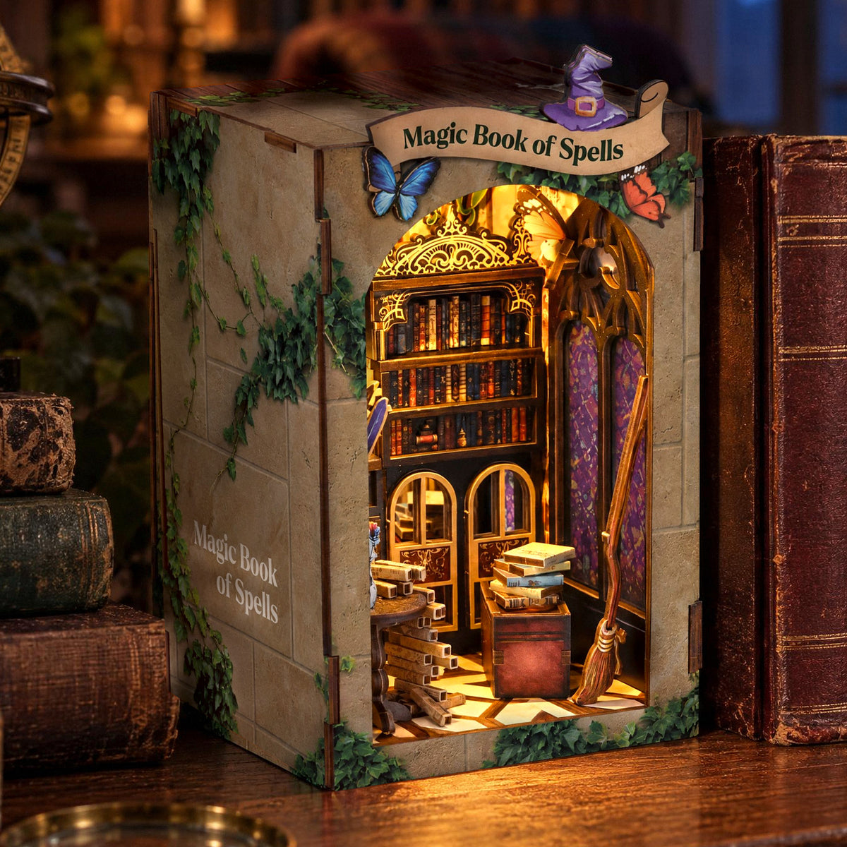 "Magic Book of Spells" at Book Nook, illuminated in the evening on a bookshelf among old leather-bound books, with ivy-covered side panels and the title