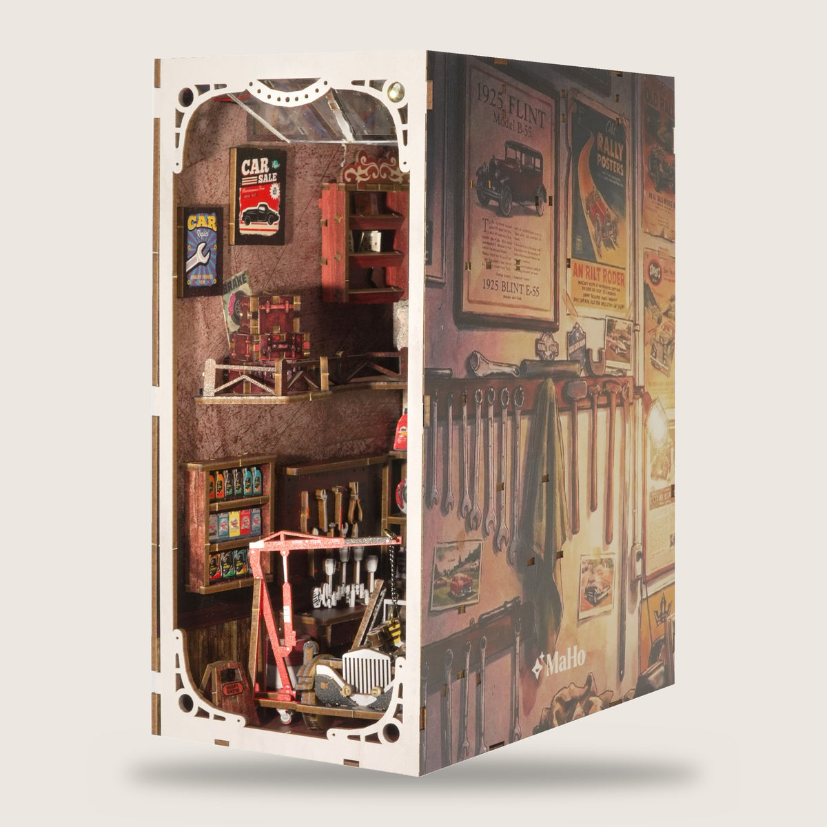Vintage Car Mechanic Book Nook, from the right: side wall with tool rack and old posters, open workshop