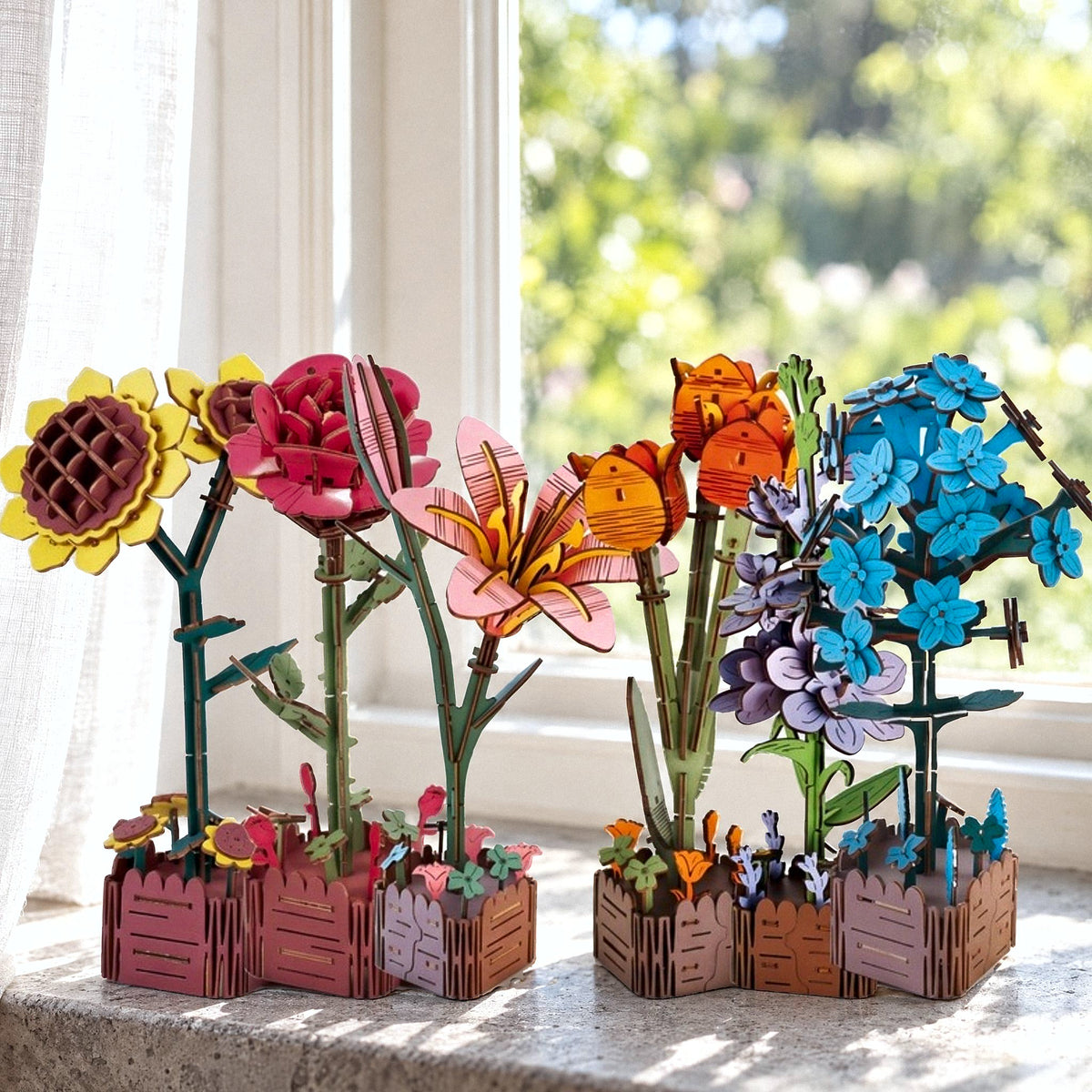 Wooden Flower Garden Set: Six wooden flowers in their wooden pots on a light-colored windowsill facing the garden