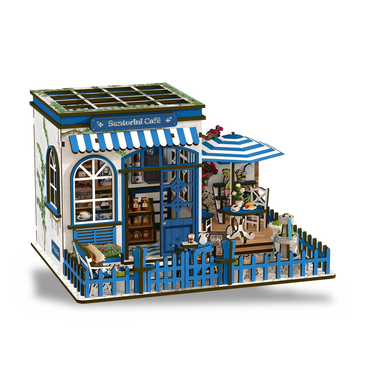 Santorini Café Miniaturhaus, freigestellt auf Weiß, Front mit Markise, Terrasse und Sonnenschirm
