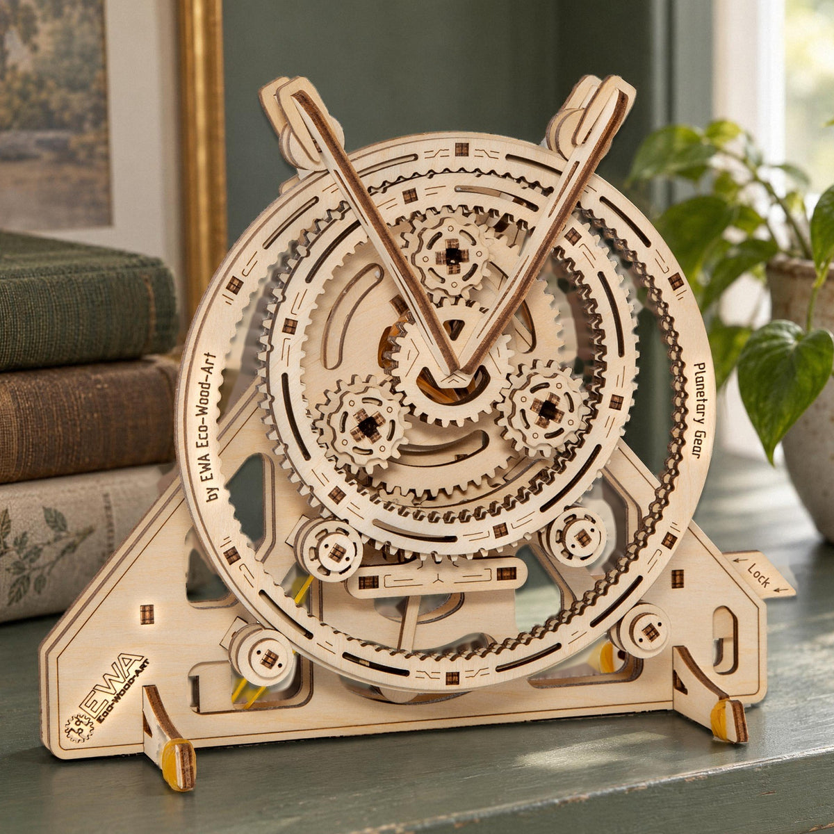 Wooden planetary gear set, finished model on a sage-green shelf in a bright living room in natural light