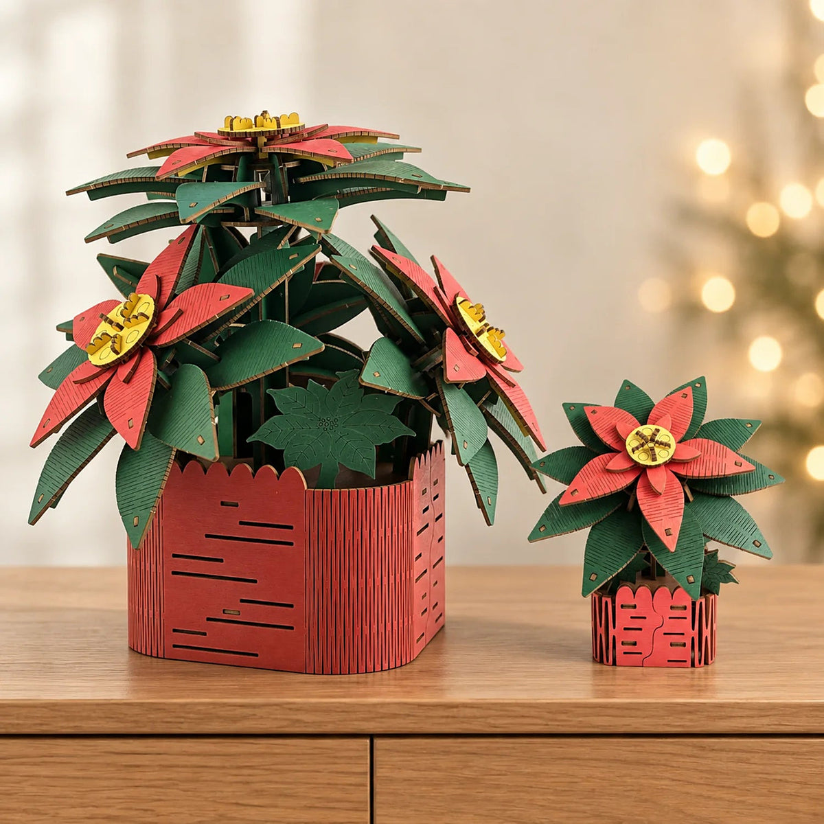 Wooden Christmas star in two sizes: a large and a small star in a red wooden pot on the sideboard, aglow with lights