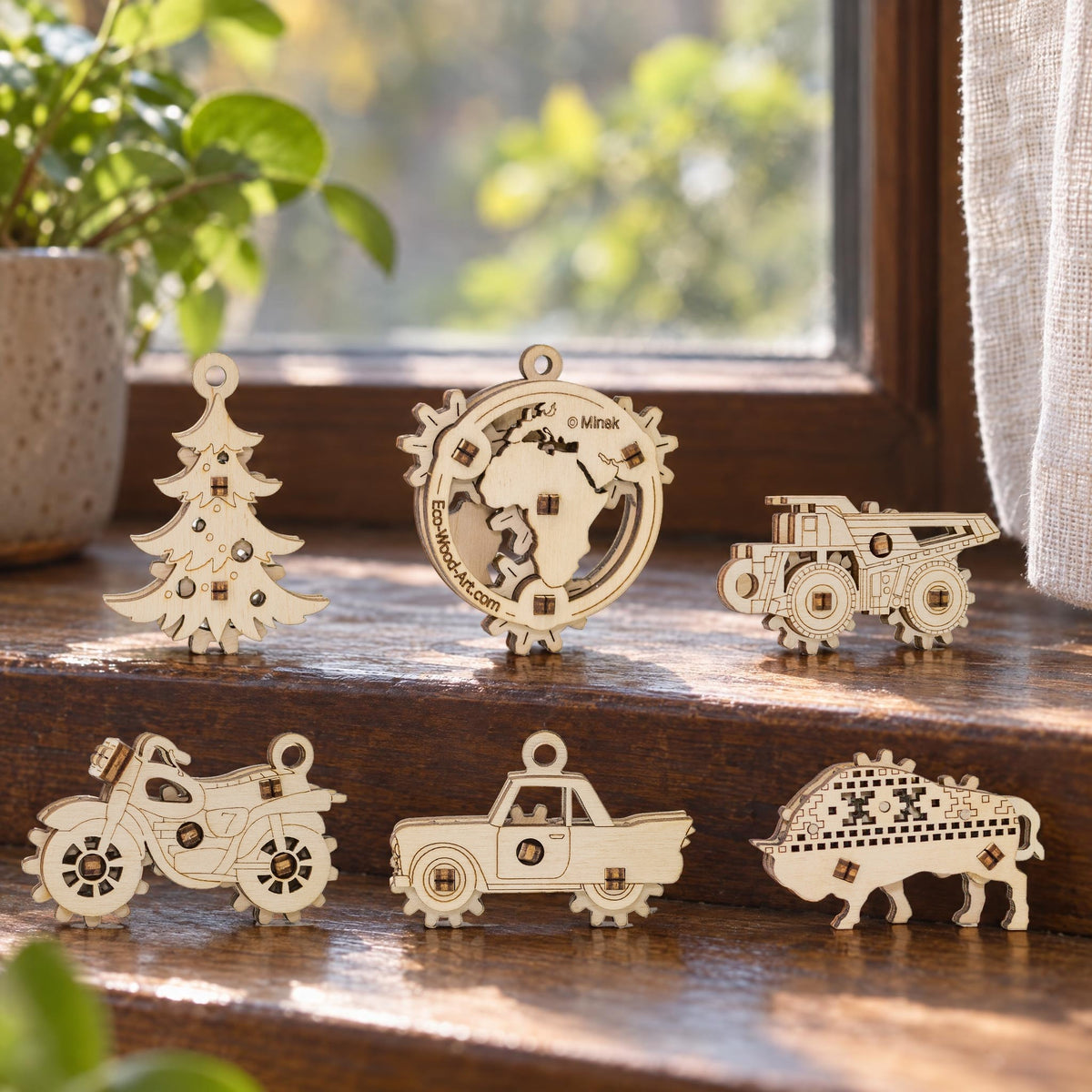 Six mini wooden puzzles—such as Bike, Car, Bison, and Globe—on a walnut windowsill in natural light