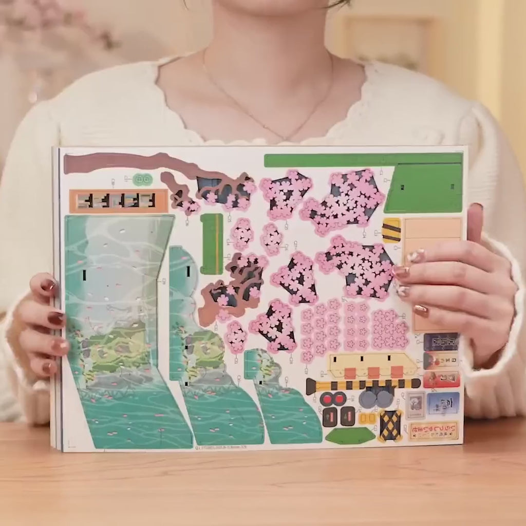 Sakura Densya Book Nook, Video: Unpacking the panels, removing the parts, building the road, and the finished scene with lighting